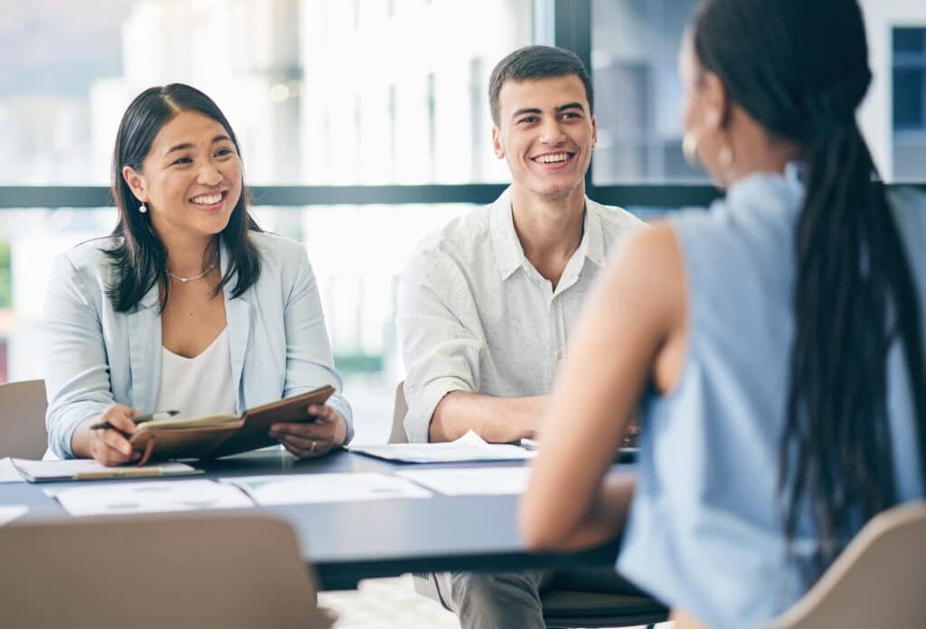 Recruiting managers in job interview with businesswoman talking or listening